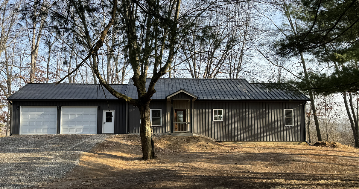 Barndominium-style home with steel exterior in Hillsdale, Michigan built by Stoll Construction