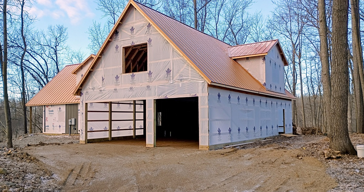 Barndominium rebuild in Jonesville, MI using post-frame construction after a house fire.